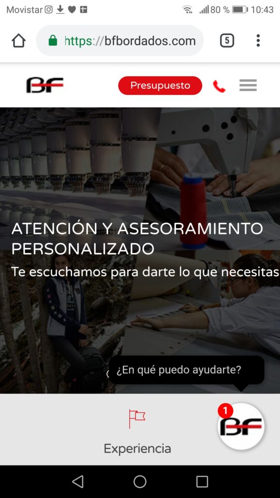 Web de BF Bordados en móvil, con el botón de contacto flotante cerrado en la esquina inferior derecha.